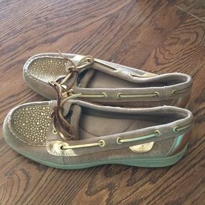 Great condition Sperry shoes size 8M Gold detailing and gold bedazzle on the toe